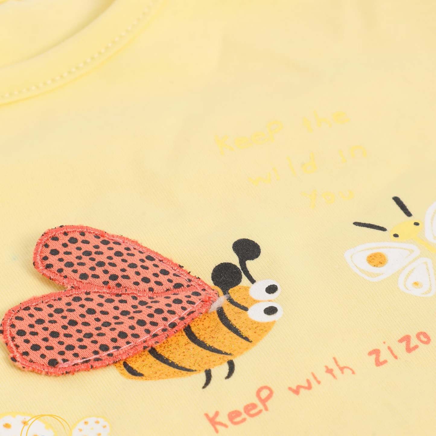 a charming baby girl's pajama set designed for ages 9 to 18 months.1081